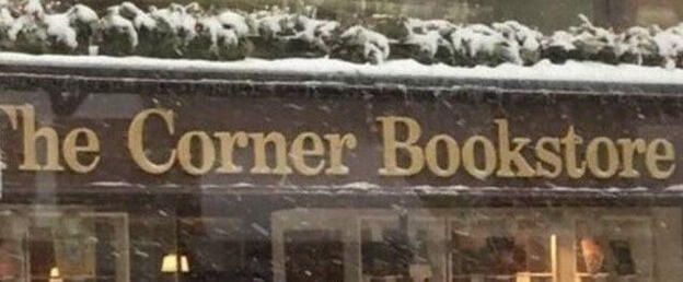Book Review: Addie Larue picture of a "The Corner Bookstore" sign
