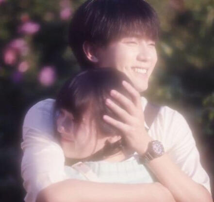 WIFTY (Rang Rang) man with black hair embracing a girl with black hair