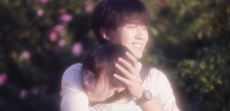 WIFTY (Rang Rang) man with black hair embracing a girl with black hair